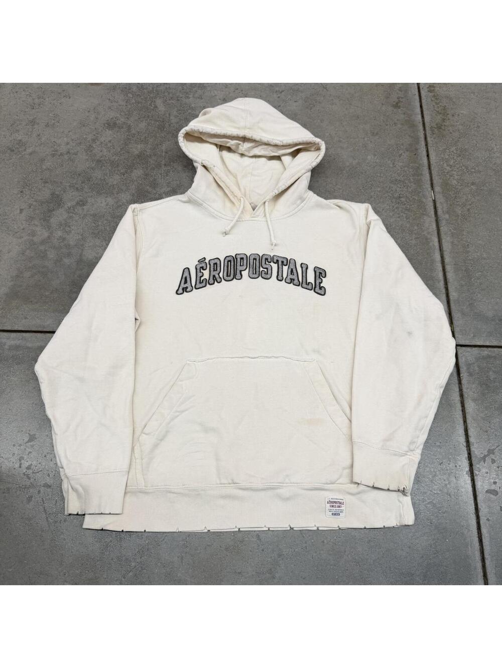 vintage aeropostale white and brown spell out hoodie size large HAS STAIN